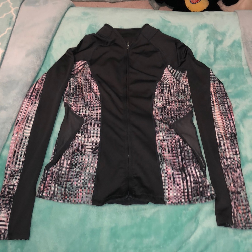 Grey running racket with mesh detailing